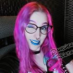 Fetish Domina Kiara femdom goth alt Domme Mistress Goddess Worship winking