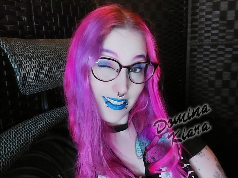 Fetish Domina Kiara femdom goth alt Domme Mistress Goddess Worship winking
