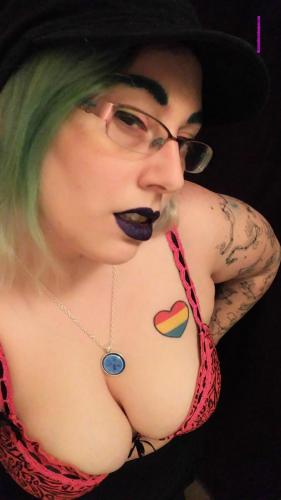punk goth femdom dominatrix Mistress Kiara cleavage